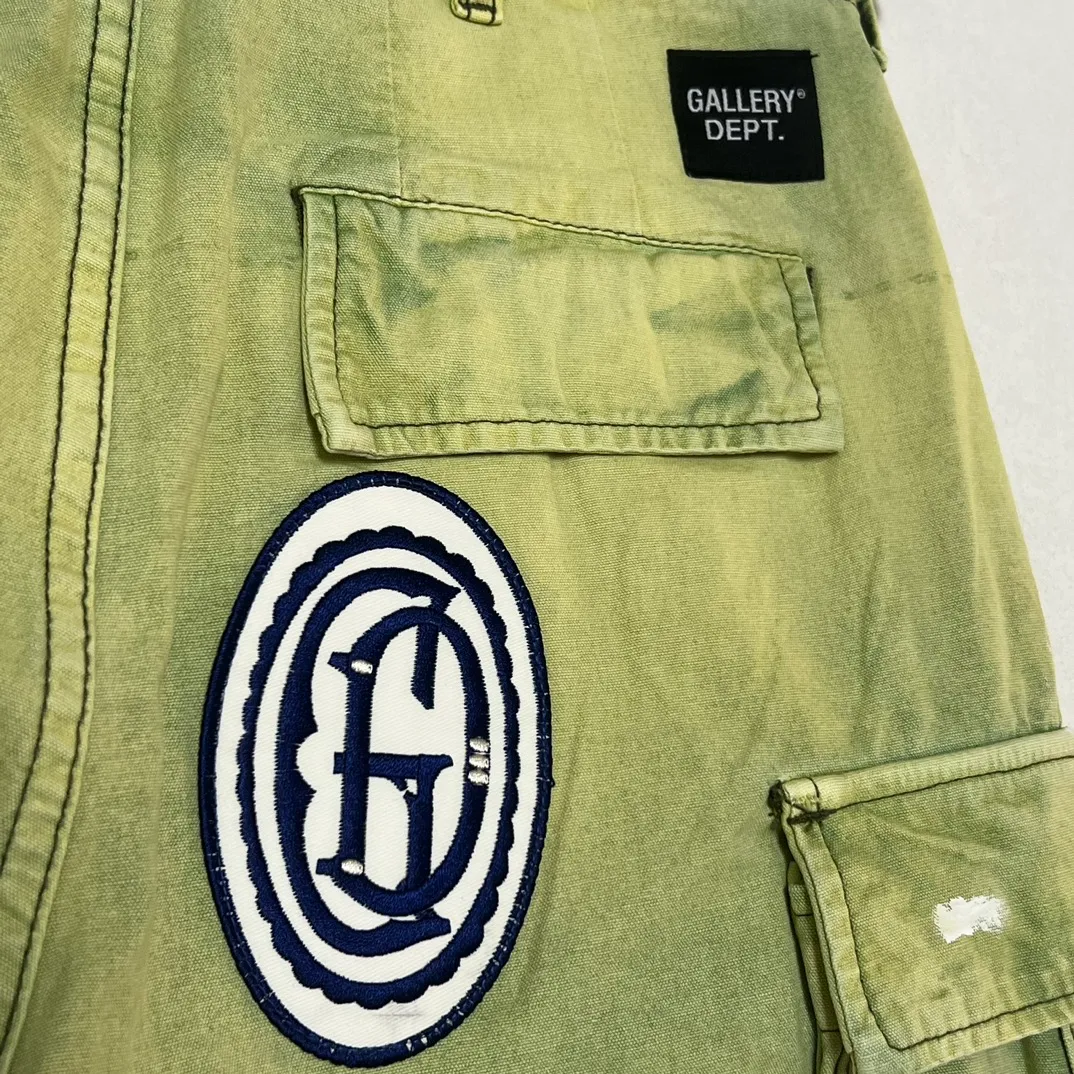 Super heavy duty! 10 embroidered stamps on full pants, one G leather stamp, GALLERY DEPT. KENZIE FATIGUE CARGO SHORTS, patch embroidered shorts, distressed splash-ink overalls, olive green size 30/32/34/36
